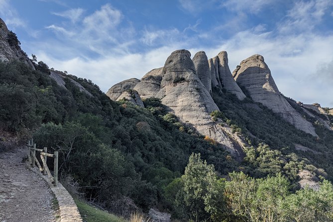 From Barcelona: Montserrat Monastery & Scenic Mountain Hike - The Sum Up