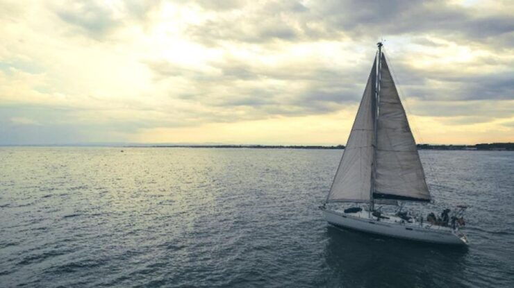 From Catania: Aci Castello Sailing Boat Trip With Aperitif - Experience Highlights