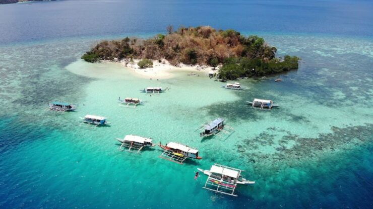 From Coron: Island Hopping Boat Day Trip With Buffet Lunch - Free Cancellation and Duration