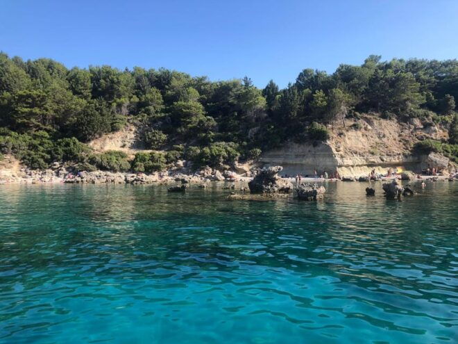 From Faliraki: Rhodes Sunset Cruise With Swimming and Snacks - Onboard Amenities