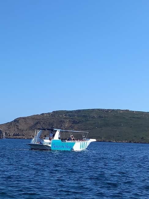 From Fornells: North Coast Beaches Cruise with Swim Stops - The First Swim Stop at Cavalleria Beach