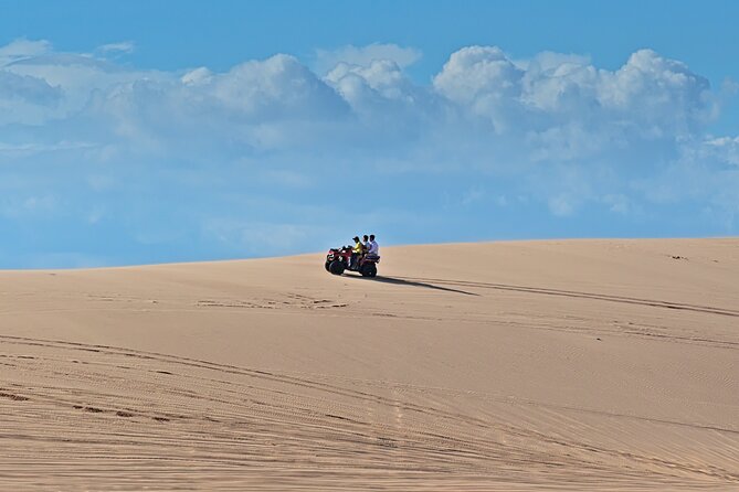From HCM City: Amazing Mui Ne Beach & Sand Dunes With Tour Guide - Exploring the Sand Dunes