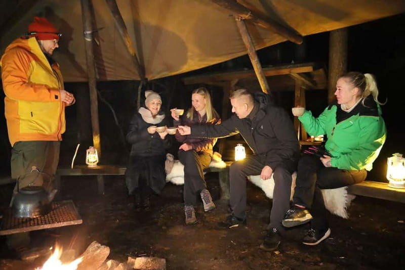 From Helsinki: Guided Forest Walk in the dark with campfire - The Campfire Experience: Warmth and Tasty Treats