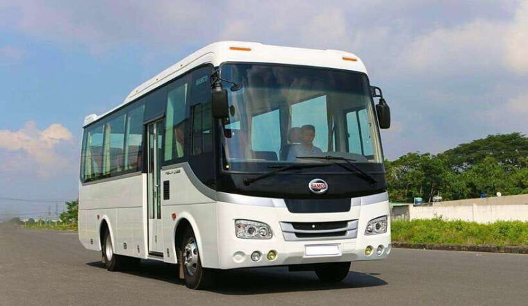From Hue: Hoi an Bus Transfer With 4 Sightseeing Stops - Transportation and Guide