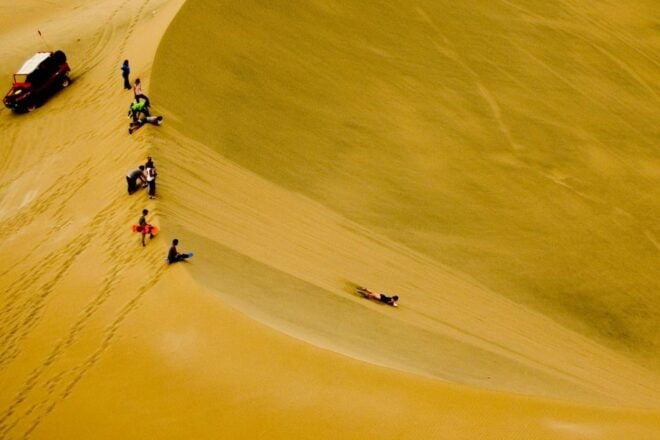 From Ica: Dune Buggy at Sunset & Sandboarding - Live Tour Guides and Languages