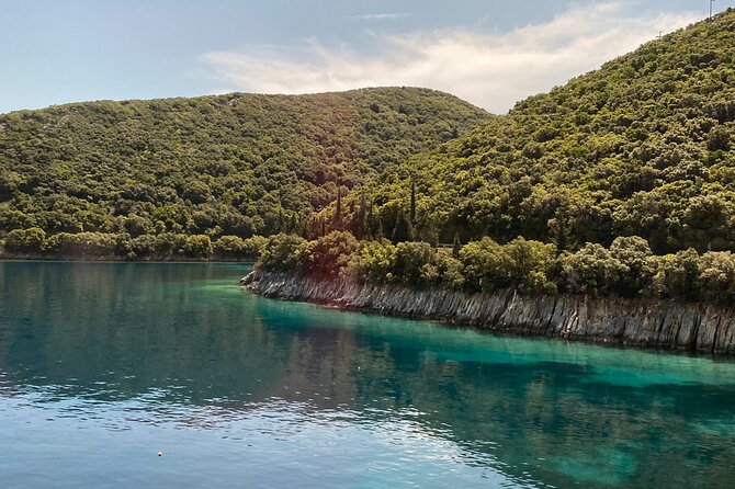 From Kefalonia: Bus & Boat Tour to Ithaca With Swim Stops - Cancellation and Weather Policies
