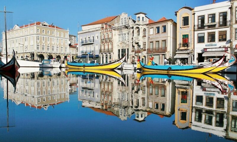 From Lisbon: Aveiro, Boat Ride, Costa Nova & Coimbra Private - The Sum Up