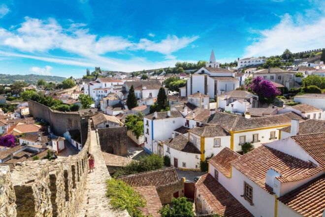 From Lisbon: Day Trip to Porto, Óbidos, and Nazaré - Background Information