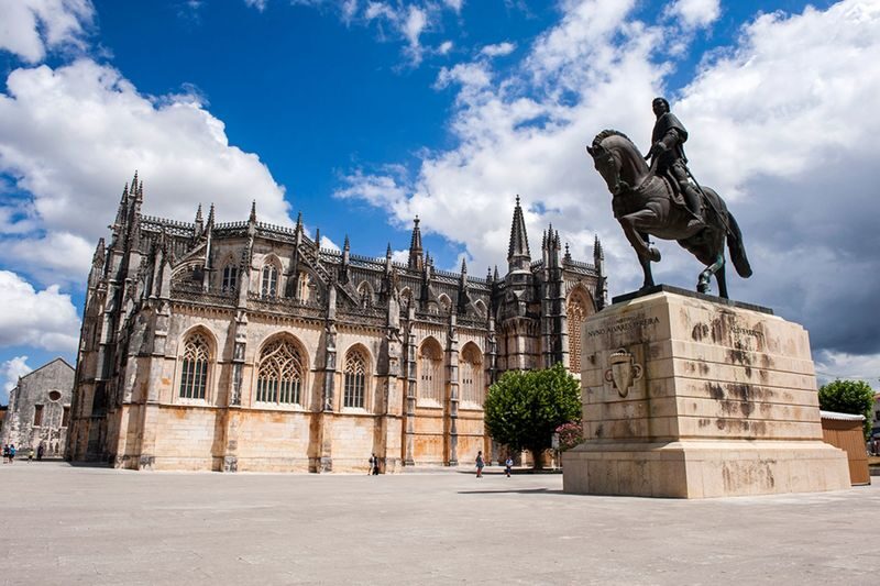 From Lisbon: Fatima, Nazare & Obidos Day Tour - 3 UNESCO Highlights - Batalha: Gothic stonework, with limited time inside