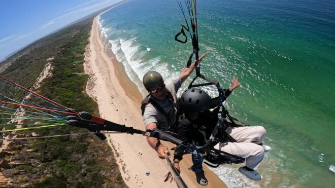 From Lisbon: Paragliding Tandem Flight - Language Options and Meeting Points