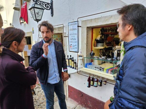 From Lisbon: Private Transfer to Porto With City Stops - Óbidos, Nazaré, and Fátima: Medieval Town, Beach Stroll, and Religious Sites