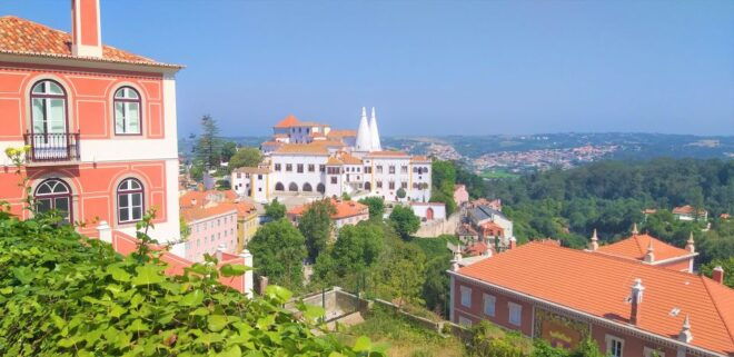 From Lisbon: Sintra, Regaleira and Pena Palace Guided Tour - Walking Through Historical Sintra
