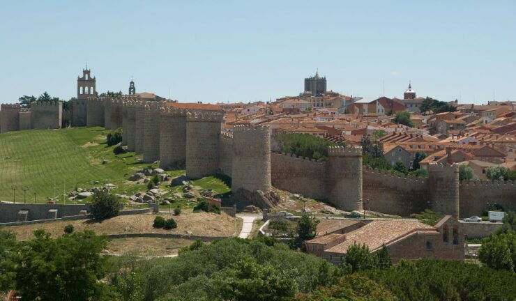 From Madrid: Full Day Tour to Avila and Segovia With Alcazar - Tour Duration and Meeting Point