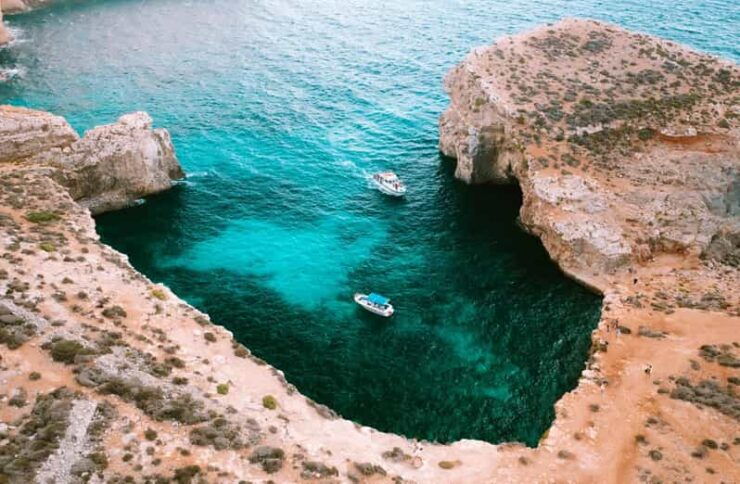 From Mellieha: Round Comino Cruise With Wine and Water - Experience Highlights