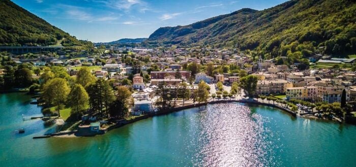 From Milan: Lugano, Bellinzona and Chocolate Factory Trip - Multilingual Tour Guide and Independent Exploration