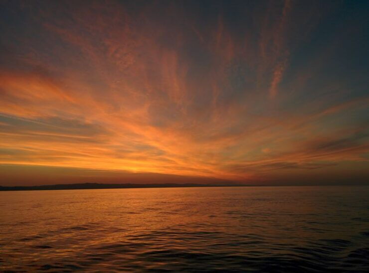 From Neos Marmaras: Sunset Sailing Tour to Coves & Islands - Tour Overview