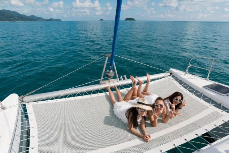 From Ornos: Rhenia Island Catamaran Cruise With Meal & SUP - Itinerary Highlights