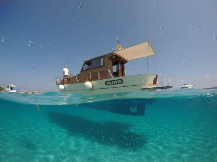 From Palau: Wooden Boat Tour to La Maddalena Archipelago - Group Size and Cancellation Policy