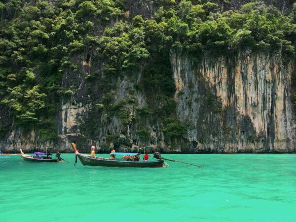 From Phi Phi: Full Day Snorkeling Trip by Longtail Boat - Sunset Views and Night Swimming Experience