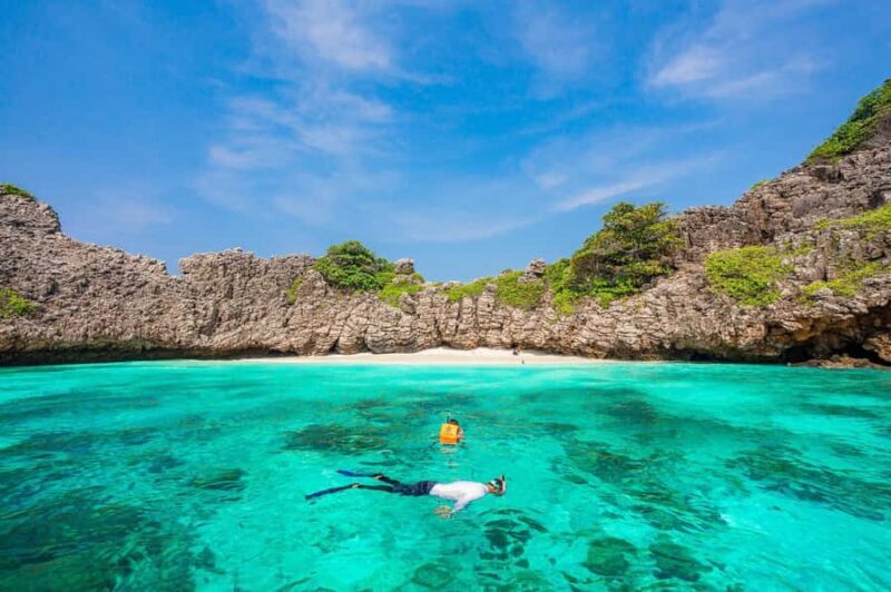 From Phuket: Koh Haa & Koh Rok Day Tour with Snorkel, Lunch - Exploring Koh Rok: Snorkeling and Beach Bliss
