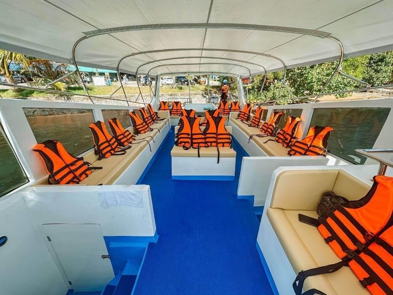 From Phuket: Phang Nga Bay Catamaran Adventure Tour - A cave stop before beach time