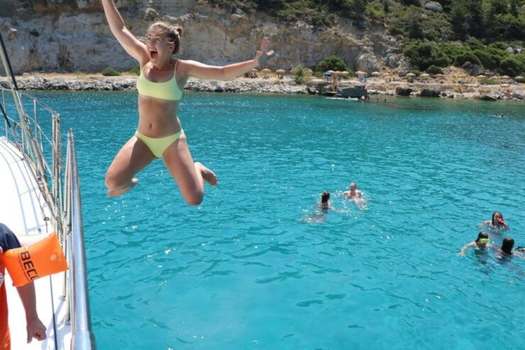 From Rhodes: Private Catamaran Cruise All Inclusive - Highlights and Activities