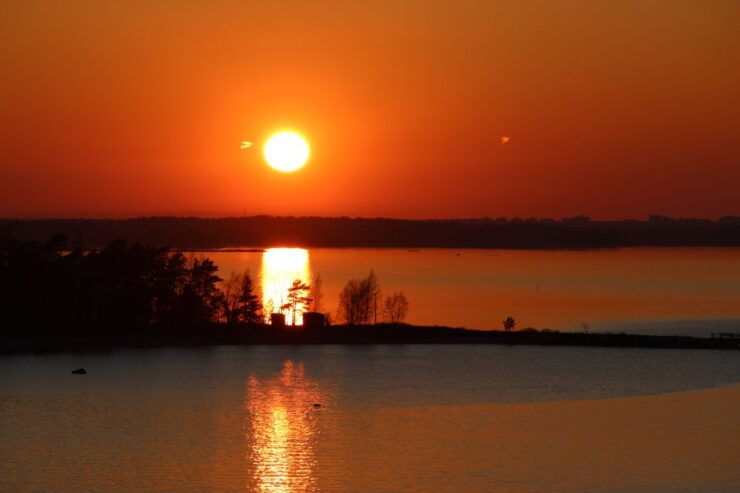 From Rovaniemi: Midnight Sun Forest Lake Float - Experience the Midnight Sun Magic