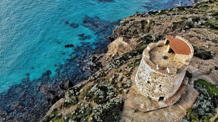 From SantAntioco: Beaches and Coves Mini Dinghy Cruise - Experience Highlights