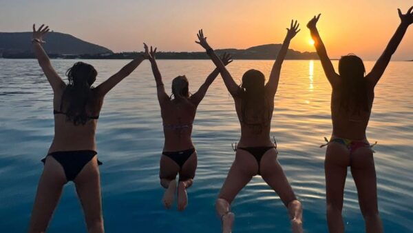 From Stintino: Aperitif on a Catamaran at Sunset - Meeting Point