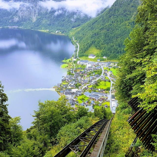 From Vienna: Day Tour to Hallstatt and Salzburg & Boat Ride - Guided Experience