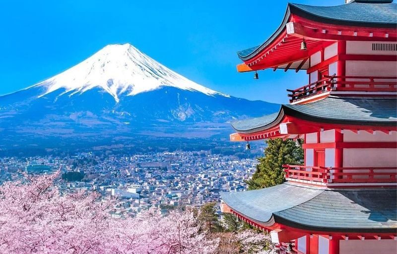 Fuji Photography Tour: Arakurayama Sengen Park, Hikawa Clock Shop, Oshino Hakkai, the most beautiful Lawson convenience store, and Lake Kawaguchiko Oishi Park (Departure from Tokyo). - Hikawa Clock Shop frames the town toward Fuji