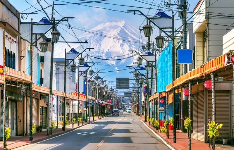 Fuji Photography Tour: Arakurayama Sengen Park, Hikawa Clock Shop, Oshino Hakkai, the most beautiful Lawson convenience store, and Lake Kawaguchiko Oishi Park (Departure from Tokyo). - The Lawson stop pairs a familiar shop with a Fuji view