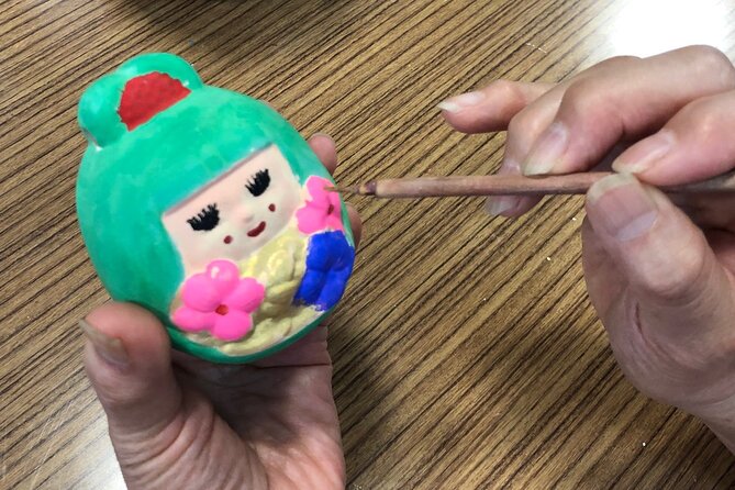 Fukuoka Open Top Bus and Hakata Doll Painting Experience With Guide - Highlights of the Hakata Doll Painting Experience