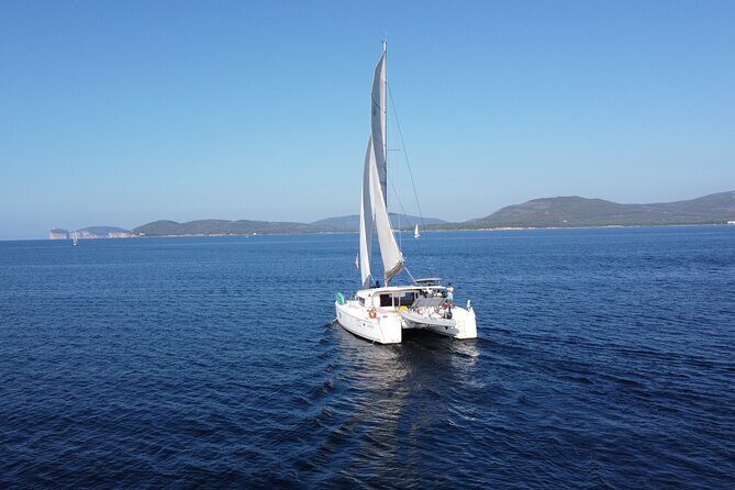 Full day catamaran tour in Alghero - The Lunch Experience: Local Flavors on the Water