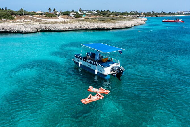 Full-Day Fully Private Boat Tours in Aruba With Nos Isla - Meeting and Pickup