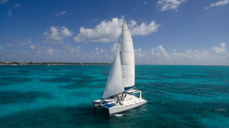 Full-Day Sail in Luxurious Catamaran to Isla Mujeres - Experience Highlights of the Catamaran Trip