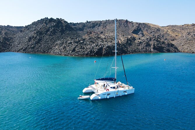 Full Day Santorini Catamaran Private Cruise With Meal and Transfer - On-Board Dining Experience