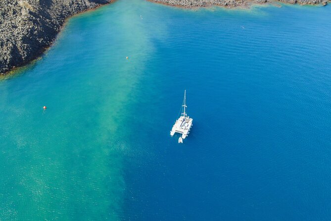 Full Day Santorini Catamaran Private Cruise With Meal and Transfer - Common Questions