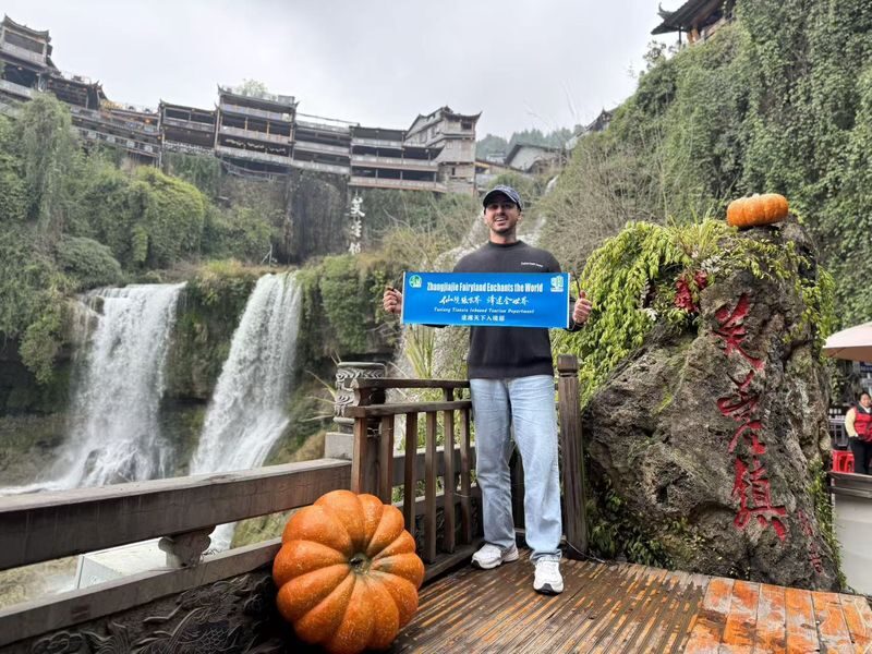 Furong Ancient Town Evening Waterfall & Stilt Houses Experience - What the evening experience centers on