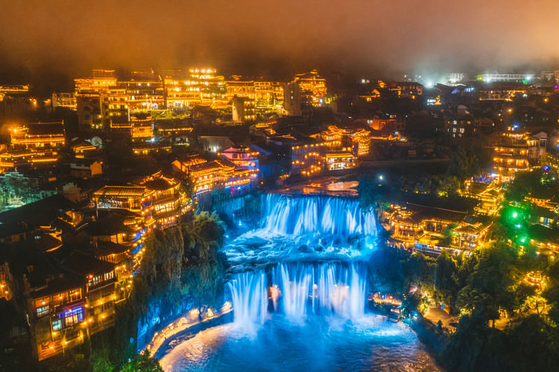 Furong Ancient Town Evening Waterfall & Stilt Houses Experience - What the price may mean for you