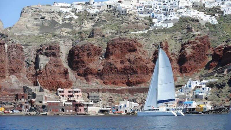 Gems of Santorini catamaran cruise experience with meal - Sunset near Oia, with a few timing caveats