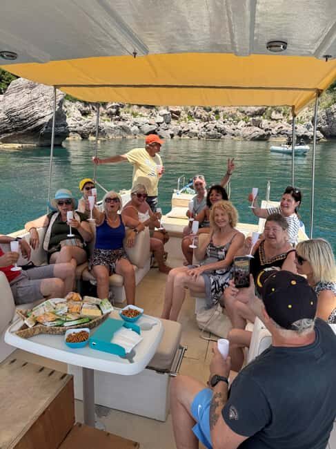 Giardini-Naxos: Sunset Boat Tour with Aperitif and Dolphins - The Experience in Detail