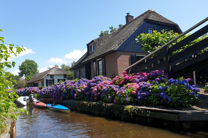 Giethoorn and Zaanse Schans Tour With Small Electric Boat Trip - Tour Overview and Inclusions