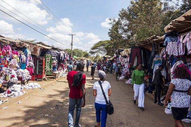 Giraffe Center Tour and Kibera Slums Guided Walking Tour - Booking Details and Confirmation