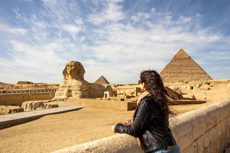 Giza Pyramids and Sphinx Half Day Tour from Cairo - The Sphinx and its long gaze