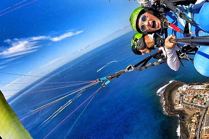 GOLD Paragliding Flight Including Videos/Photos, T-Shirt and a Bottle of Cava - Viator Help Center, Product Code, and Pricing