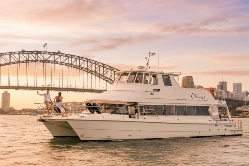 Golden Glow Sunset Sydney Harbour Cruise - Golden light, city lights and uncertain skies