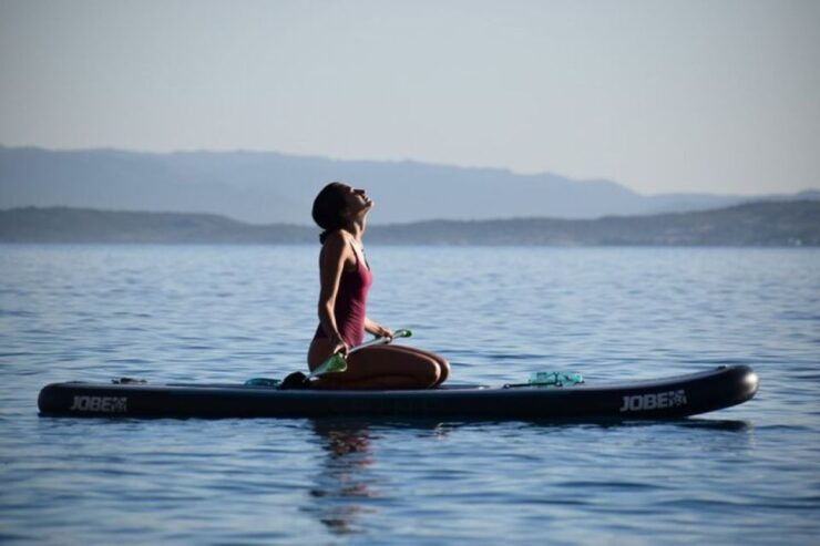 Golfo Aranci: Dolphin Watching SUP Paddleboard Tour - Tour Duration and Instructor Details