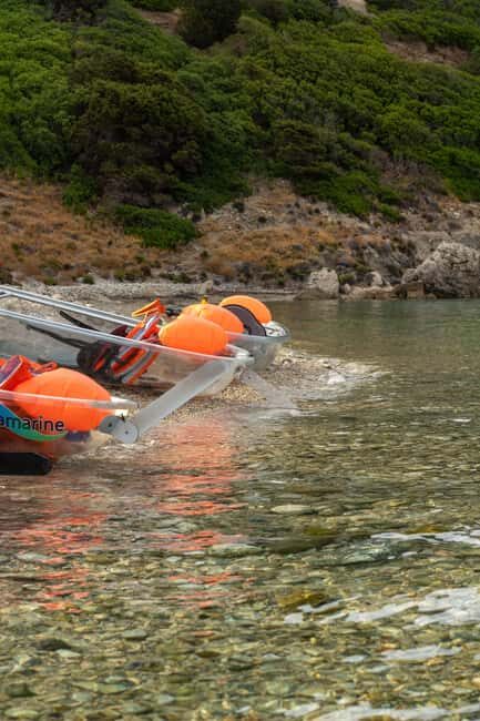 Golfo Aranci: traditional or transparent kayaks, dolphins, and aperitifs - The scenic stops