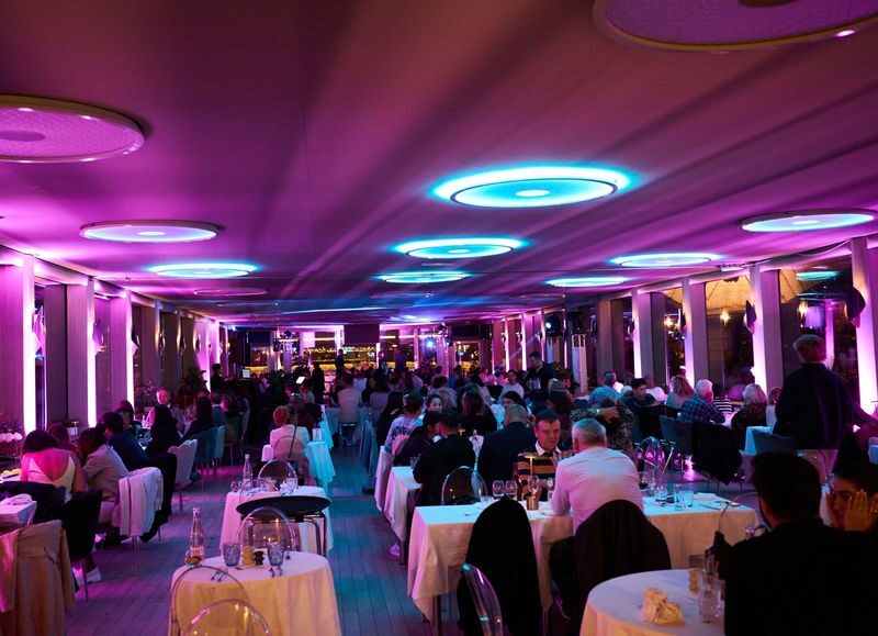Gourmet Dinner Cruise on Seine River with Live Music in Paris - Music, dancing, and the mood onboard